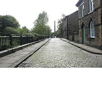 Cobbled road in Victorian Saltaire Bradford